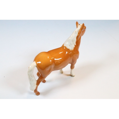 57 - Group of three Beswick horse figurines to include a Palamino example together with decorative Beswic... 