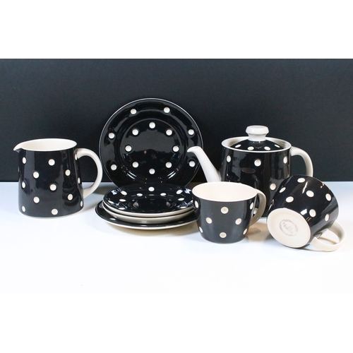 6 - A T.G. Green black and white polka dot domino tea set comprising of teapot, two cups, two saucers, t... 