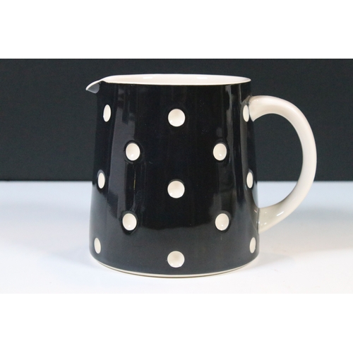 6 - A T.G. Green black and white polka dot domino tea set comprising of teapot, two cups, two saucers, t... 