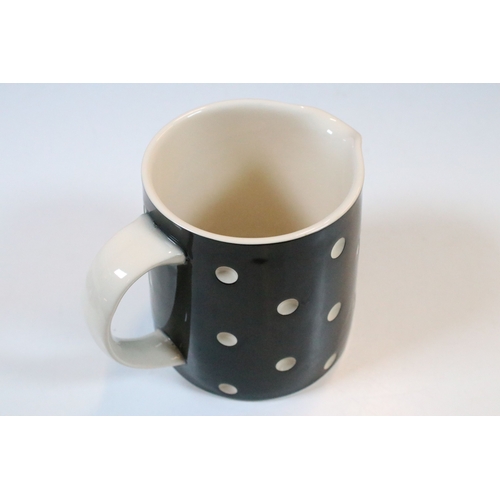 6 - A T.G. Green black and white polka dot domino tea set comprising of teapot, two cups, two saucers, t... 