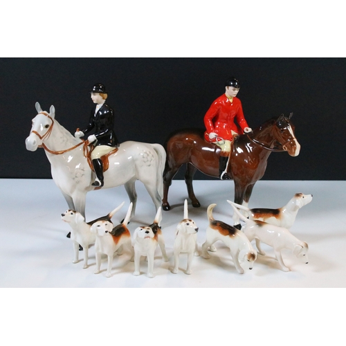 7 - Beswick hunt figurines to include huntsman, huntswoman and seven hounds (9)