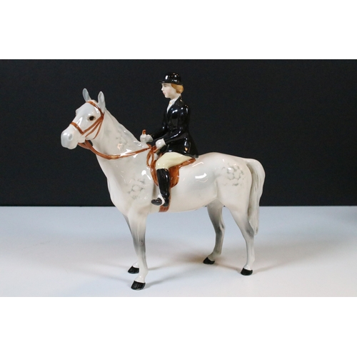 7 - Beswick hunt figurines to include huntsman, huntswoman and seven hounds (9)