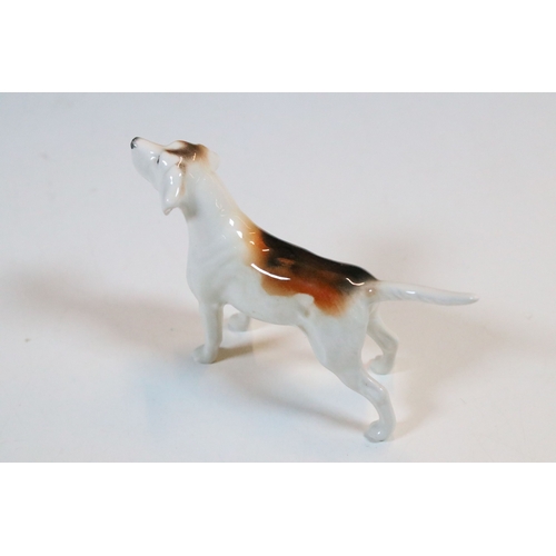 7 - Beswick hunt figurines to include huntsman, huntswoman and seven hounds (9)