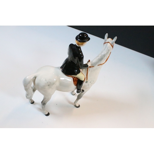 7 - Beswick hunt figurines to include huntsman, huntswoman and seven hounds (9)