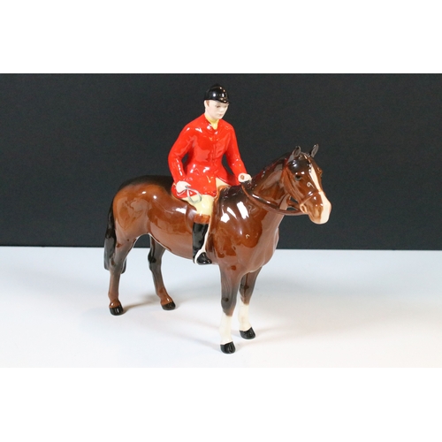 7 - Beswick hunt figurines to include huntsman, huntswoman and seven hounds (9)
