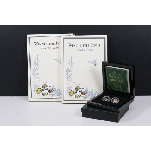 244 - A Bradford Exchange Winnie the Pooh 50p coin set to include three solid 24ct gold examples with colo... 