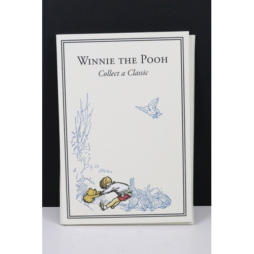 244 - A Bradford Exchange Winnie the Pooh 50p coin set to include three solid 24ct gold examples with colo... 