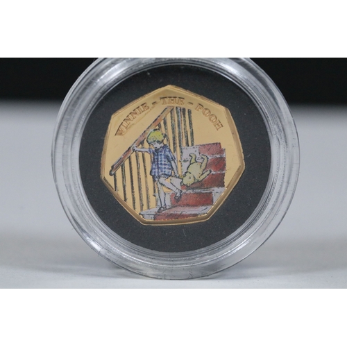 244 - A Bradford Exchange Winnie the Pooh 50p coin set to include three solid 24ct gold examples with colo... 