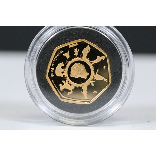 244 - A Bradford Exchange Winnie the Pooh 50p coin set to include three solid 24ct gold examples with colo... 