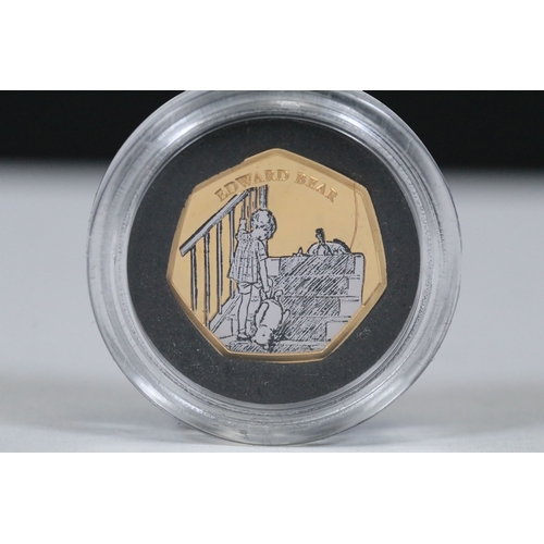 244 - A Bradford Exchange Winnie the Pooh 50p coin set to include three solid 24ct gold examples with colo... 