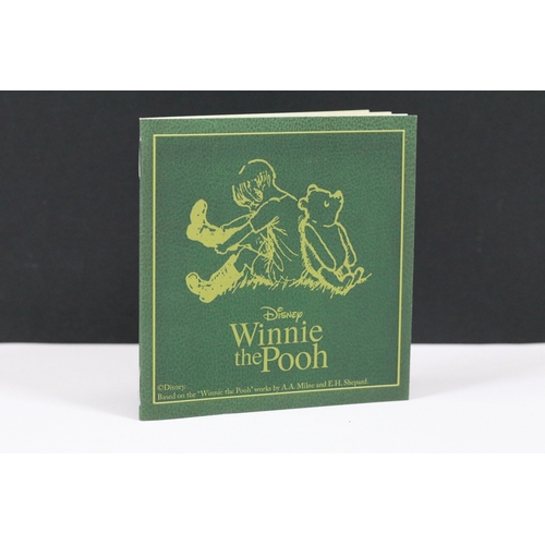 244 - A Bradford Exchange Winnie the Pooh 50p coin set to include three solid 24ct gold examples with colo... 