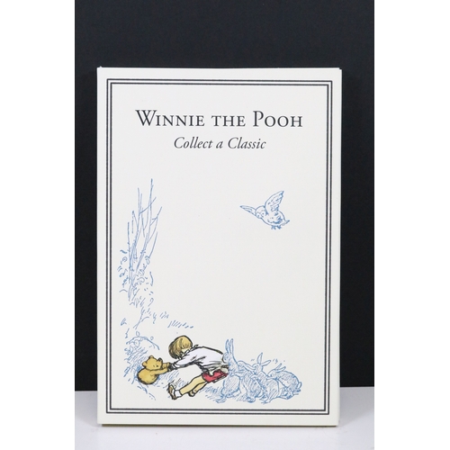 244 - A Bradford Exchange Winnie the Pooh 50p coin set to include three solid 24ct gold examples with colo... 
