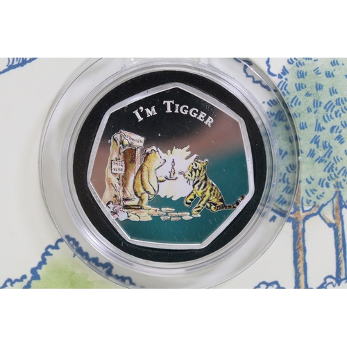 244 - A Bradford Exchange Winnie the Pooh 50p coin set to include three solid 24ct gold examples with colo... 