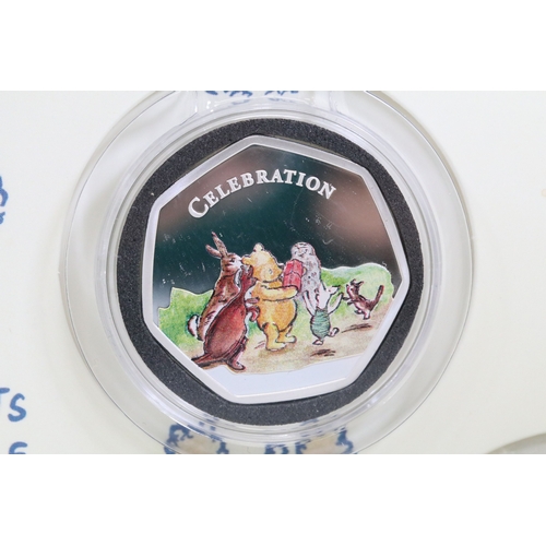 244 - A Bradford Exchange Winnie the Pooh 50p coin set to include three solid 24ct gold examples with colo... 