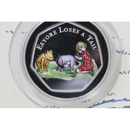 244 - A Bradford Exchange Winnie the Pooh 50p coin set to include three solid 24ct gold examples with colo... 
