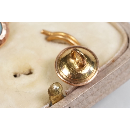 56 - Set of Arts and Crafts dress studs being set with ceramic blue cabochons (gold plated unmarked) toge... 