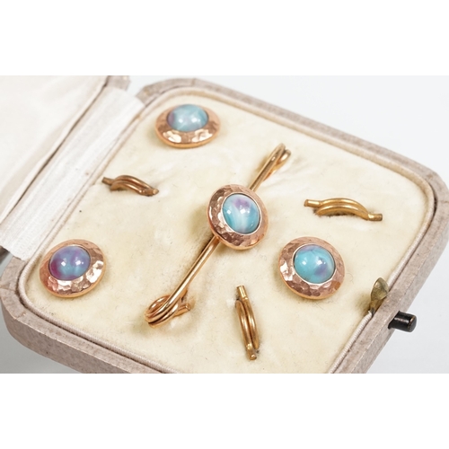 56 - Set of Arts and Crafts dress studs being set with ceramic blue cabochons (gold plated unmarked) toge... 
