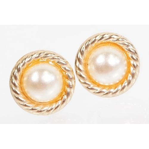 144 - Collection of 9ct gold and yellow metal stud earrings to include a pair of opal studs, coral studs, ... 