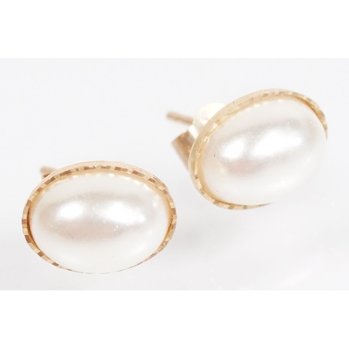 144 - Collection of 9ct gold and yellow metal stud earrings to include a pair of opal studs, coral studs, ... 