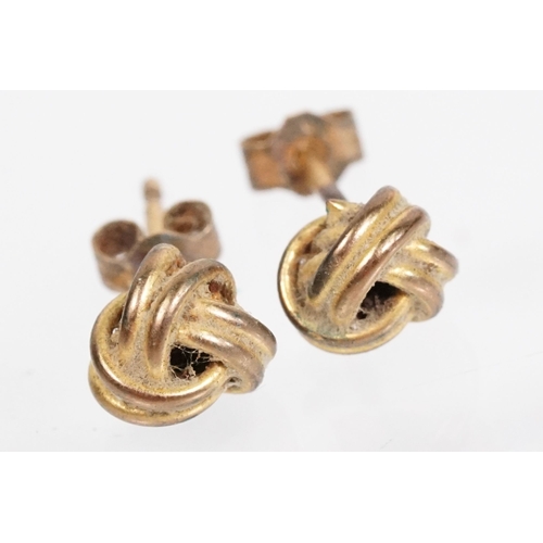 144 - Collection of 9ct gold and yellow metal stud earrings to include a pair of opal studs, coral studs, ... 