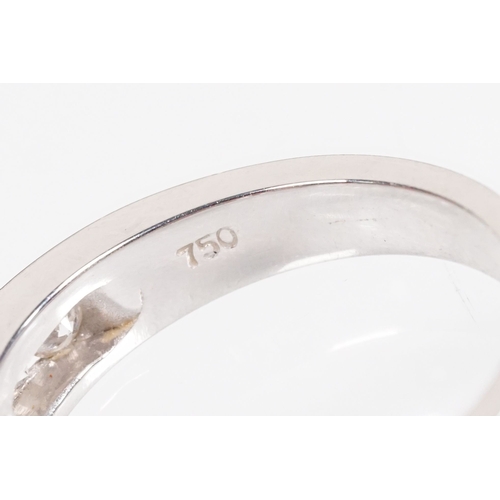 15 - 18ct white gold and diamond half eternity ring. The ring being set with ten round brilliant cut diam... 