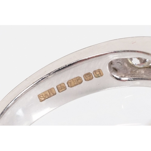 15 - 18ct white gold and diamond half eternity ring. The ring being set with ten round brilliant cut diam... 