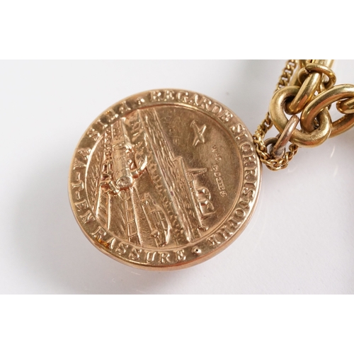 163 - 18ct gold charm bracelet having a curb link chain and spring ring clasp (marked 750), traffic light ... 