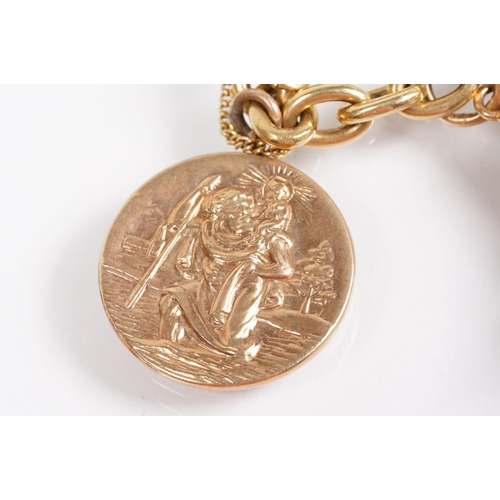 163 - 18ct gold charm bracelet having a curb link chain and spring ring clasp (marked 750), traffic light ... 