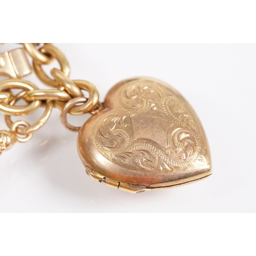 163 - 18ct gold charm bracelet having a curb link chain and spring ring clasp (marked 750), traffic light ... 