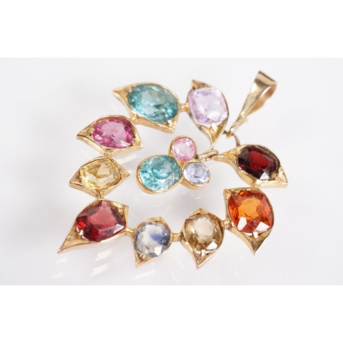 171 - Vintage multi gem pendant, being set with a selection of faceted gems including almandine garnet, he... 