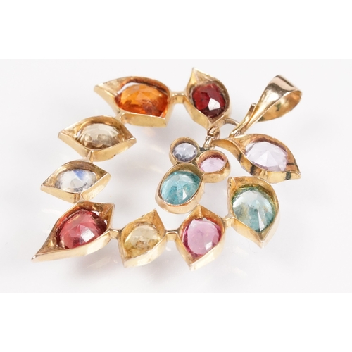 171 - Vintage multi gem pendant, being set with a selection of faceted gems including almandine garnet, he... 