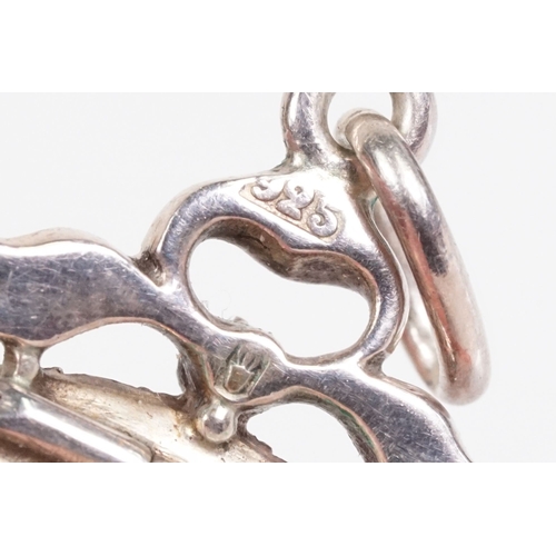 173 - Early 20th Century Edwardian silver and paste locket of round form set with round cut paste stones w... 