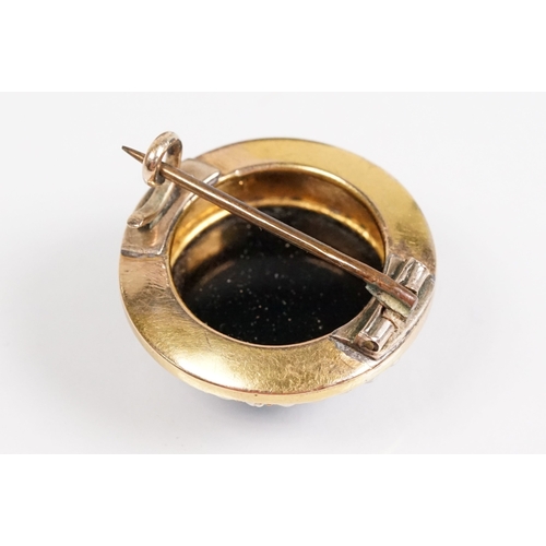 35 - 19th Century Victorian carved black stone cameo brooch being set with a round hand carved cameo port... 