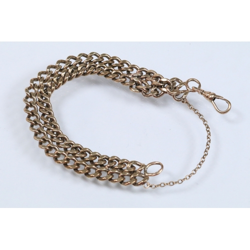122 - 9ct gold flat link double chain bracelet with dog lead clasp. Hallmarked Birmingham 1979. Measures 9... 