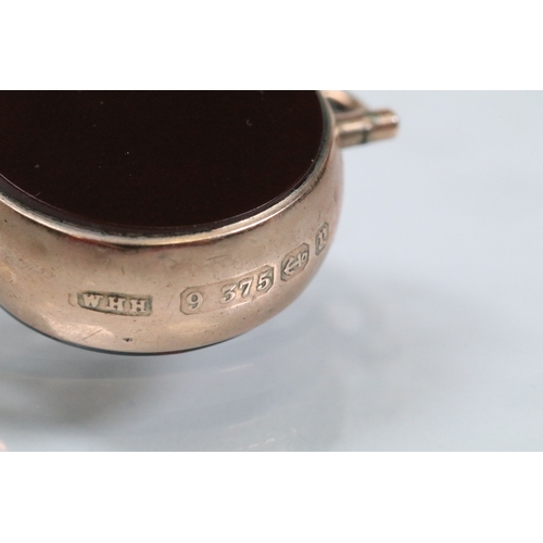 128 - 9ct gold Victorian bloodstone and onyx swivel fob (hallmarked Birmingham 1898) together with a 9ct g... 