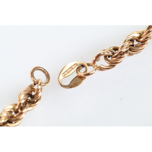 145 - Two gold necklaces to include a rope twist necklace (clasp missing, hallmarked to jump link, measure... 