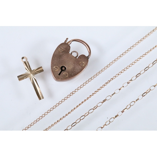 151 - 9ct gold heart padlock clasp marked JP, 9ct. Measures 2.2cm. Together with a 9ct gold cross pendant ... 