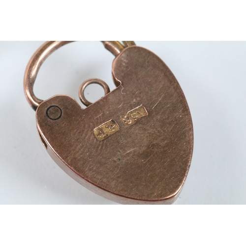 151 - 9ct gold heart padlock clasp marked JP, 9ct. Measures 2.2cm. Together with a 9ct gold cross pendant ... 