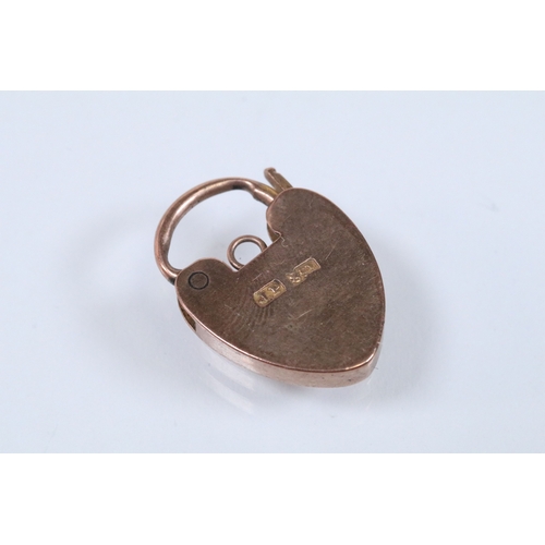 151 - 9ct gold heart padlock clasp marked JP, 9ct. Measures 2.2cm. Together with a 9ct gold cross pendant ... 