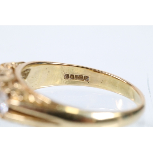 180 - 18ct gold and diamond ring, set with three principle round brilliant cut diamonds with a further fou... 