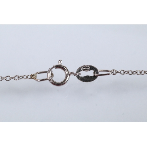 19 - 18ct white gold and diamond pendant necklace. The pendant being bezel set with eighteen round brilli... 