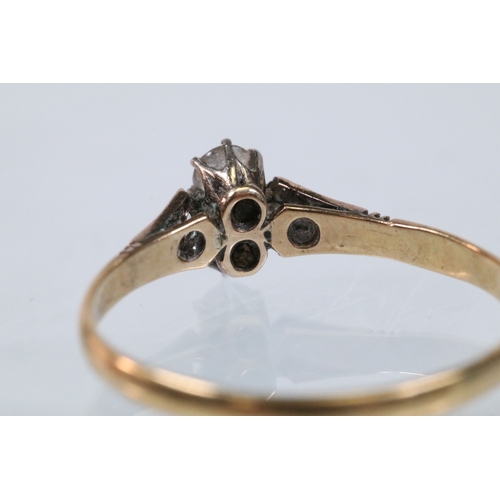 48 - Art Deco 18ct gold and platinum ring being set with two white sapphires to the head flanked by two a... 