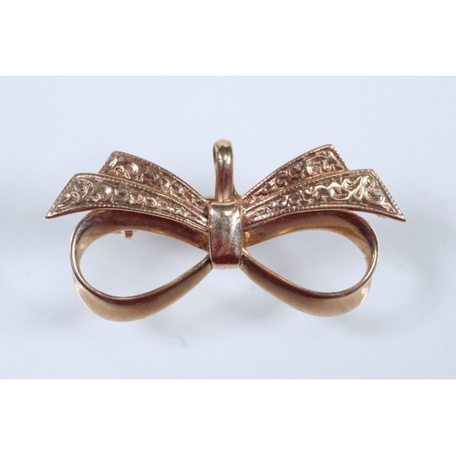 59 - 9ct gold bow brooch with pendant bale with engraved details (hallmarked Birmingham 1970), together w... 