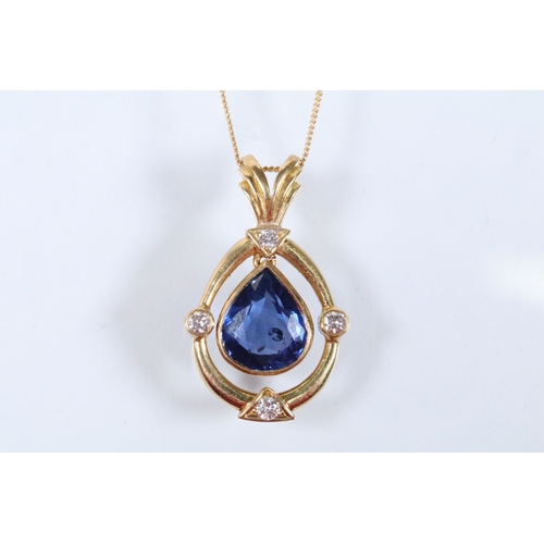 6 - 18ct gold, sapphire and diamond pendant necklace. The necklace being bezel set with a mixed pear cut... 