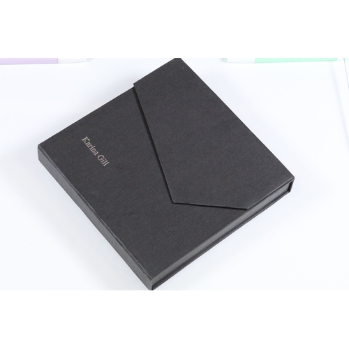 23 - Karina Gill silver and amethyst pendant necklace. The necklace constructed from textured bar links w... 