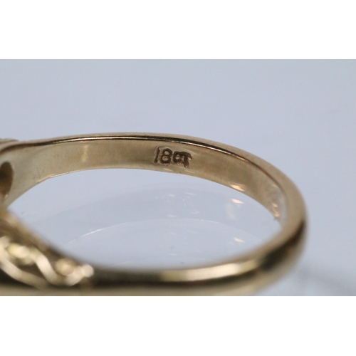 12 - Early 20th Century 18ct gold and diamond three stone ring. The ring being set with three old cushion... 