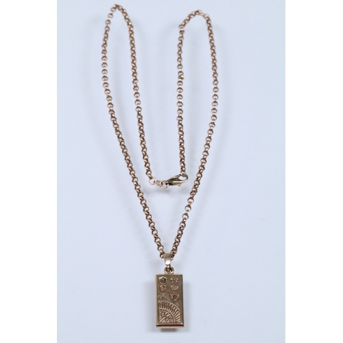 126 - 9ct gold ingot pendant set to a belcher link chain. Ingot hallmarked Birmingham 2000. Chain hallmark... 