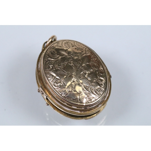 140 - Two 19th Century gold plated lockets to include an engine turned and engraved locket with woven hair... 