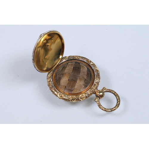 140 - Two 19th Century gold plated lockets to include an engine turned and engraved locket with woven hair... 