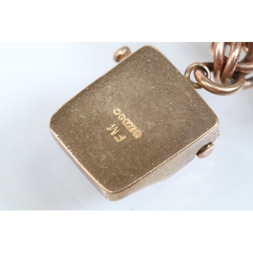 49 - 9ct gold charm bracelet having a double curb link chain. All charms hallmarked apart from carriage, ... 